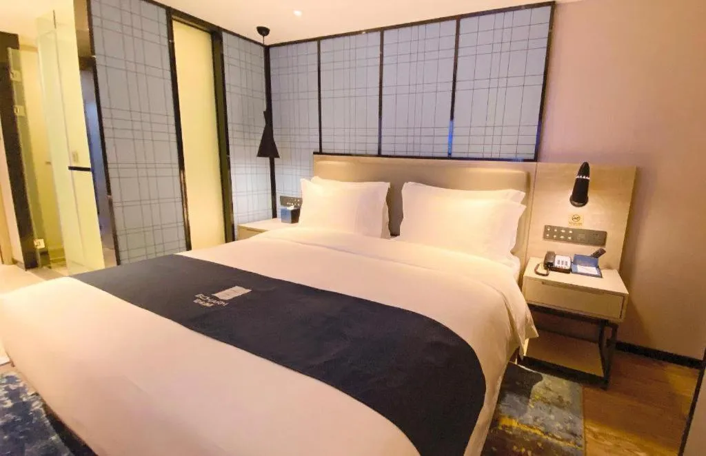 Bed in Echarm Hotel Shenzhen World Exhibition and Convention Center