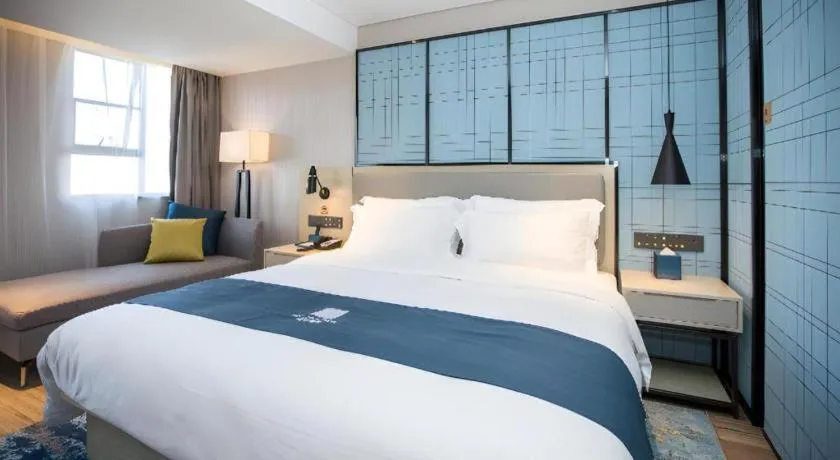 Bed in Echarm Hotel Shenzhen World Exhibition and Convention Center