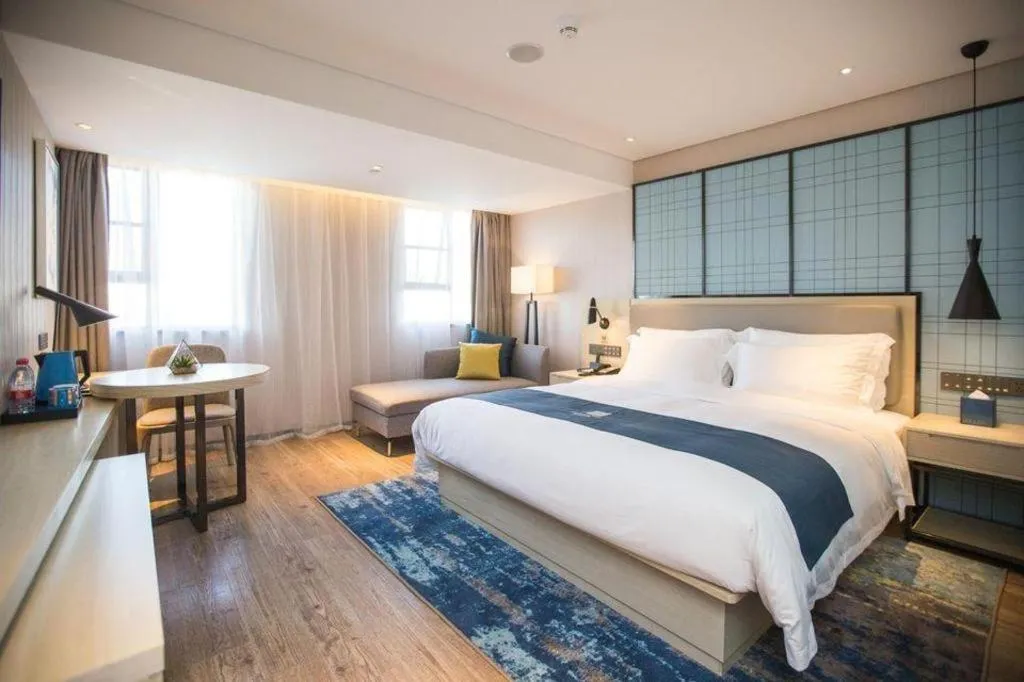 Bed in Echarm Hotel Shenzhen World Exhibition and Convention Center