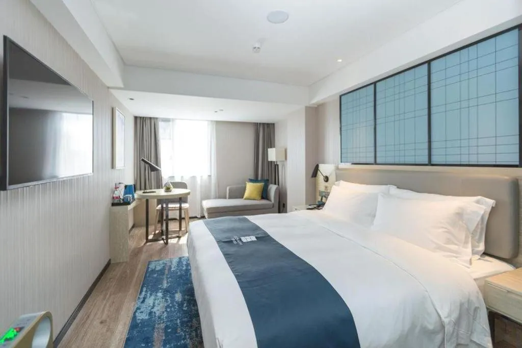 Bed in Echarm Hotel Shenzhen World Exhibition and Convention Center