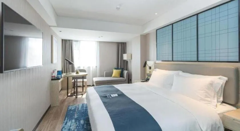 Bed in Echarm Hotel Shenzhen World Exhibition and Convention Center