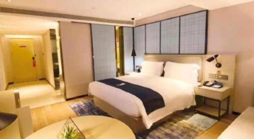 Bed in Echarm Hotel Shenzhen World Exhibition and Convention Center