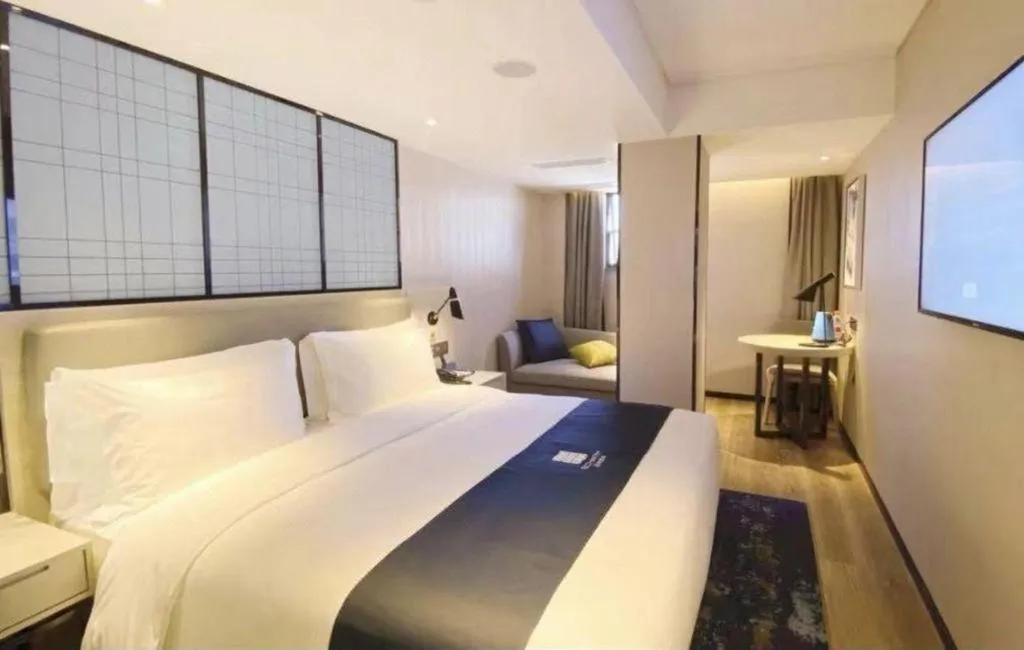 Bed in Echarm Hotel Shenzhen World Exhibition and Convention Center