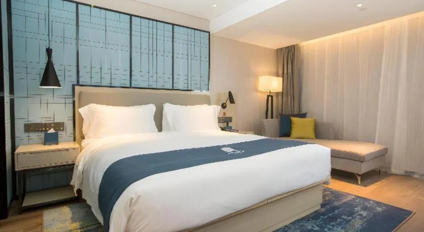 Bed in Echarm Hotel Shenzhen World Exhibition and Convention Center