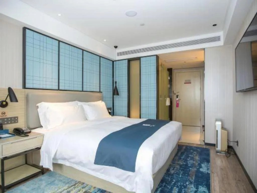 Bed in Echarm Hotel Shenzhen World Exhibition and Convention Center