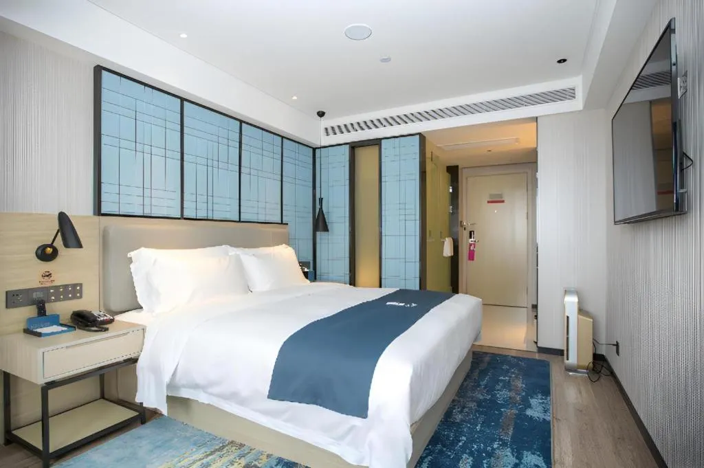 Bed in Echarm Hotel Shenzhen World Exhibition and Convention Center
