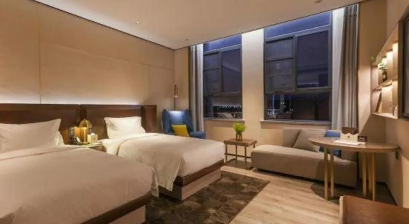 Bed in Echarm Plus Hotel Wuhan Wenhua Boulevard Dahualing Subway Statiom