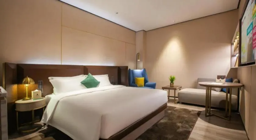 Bed in Echarm Plus Hotel Wuhan Wenhua Boulevard Dahualing Subway Statiom