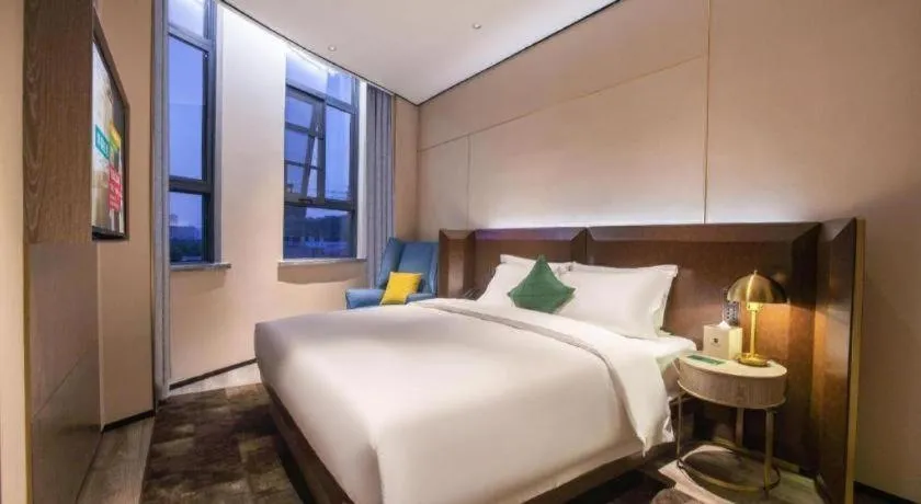 Bed in Echarm Plus Hotel Wuhan Wenhua Boulevard Dahualing Subway Statiom