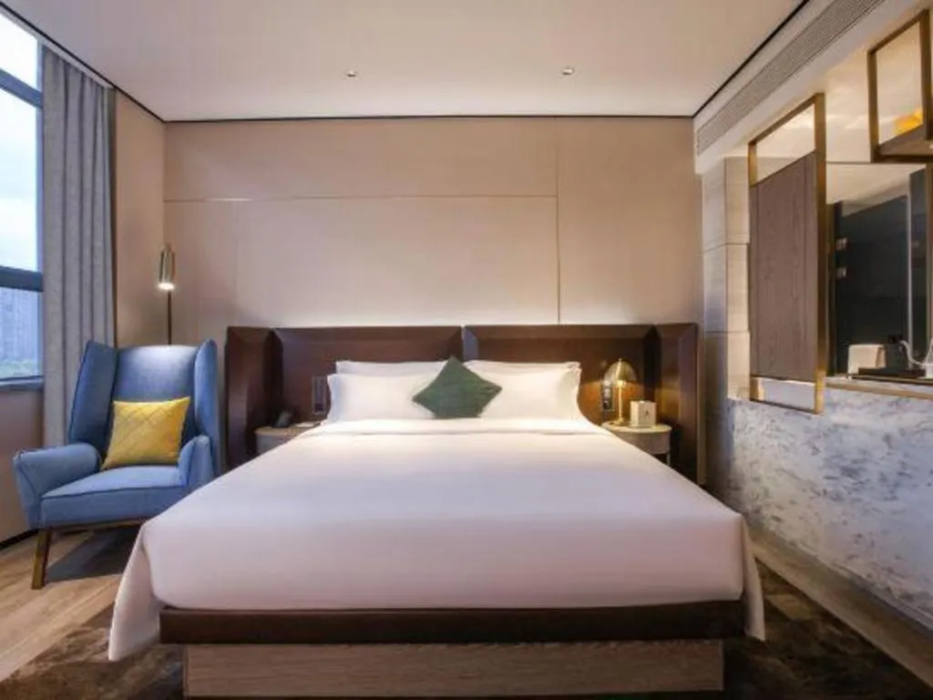 Bed in Echarm Plus Hotel Wuhan Wenhua Boulevard Dahualing Subway Statiom