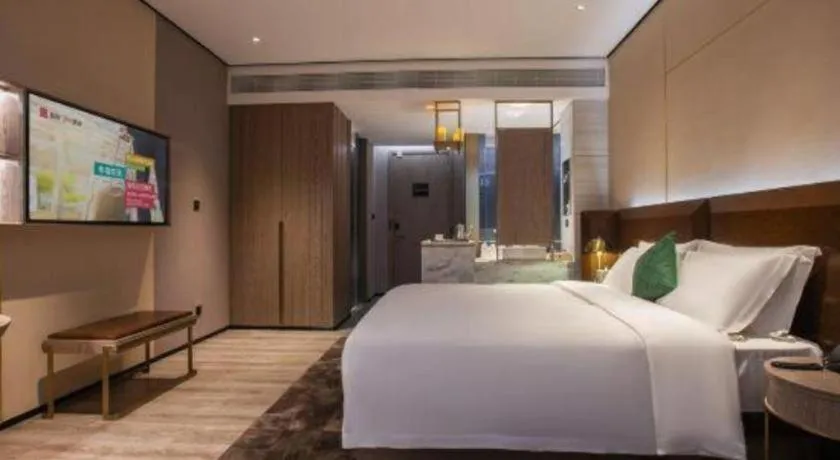 Bed in Echarm Plus Hotel Wuhan Wenhua Boulevard Dahualing Subway Statiom