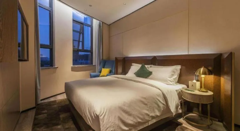 Bed in Echarm Plus Hotel Wuhan Wenhua Boulevard Dahualing Subway Statiom