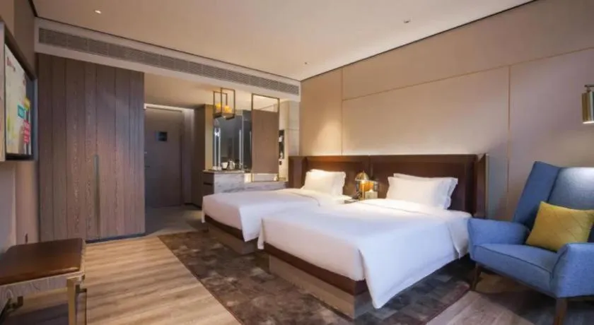 Bed in Echarm Plus Hotel Wuhan Wenhua Boulevard Dahualing Subway Statiom