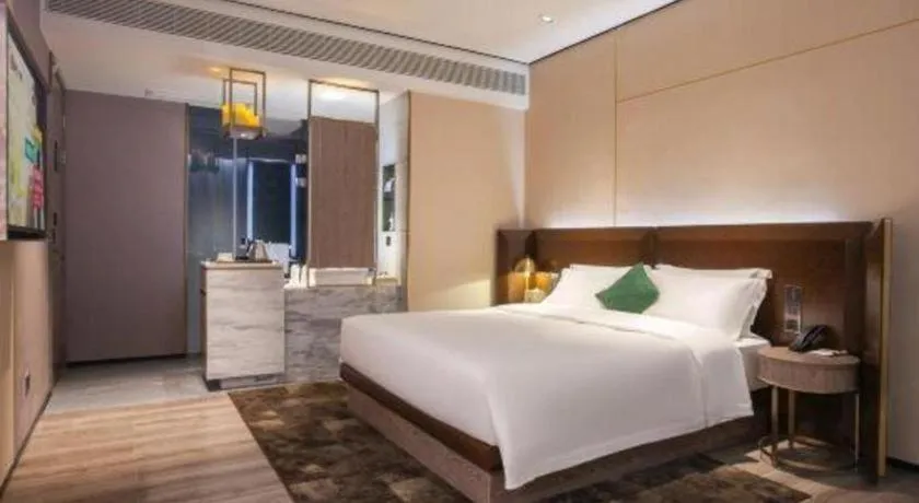 Bed in Echarm Plus Hotel Wuhan Wenhua Boulevard Dahualing Subway Statiom