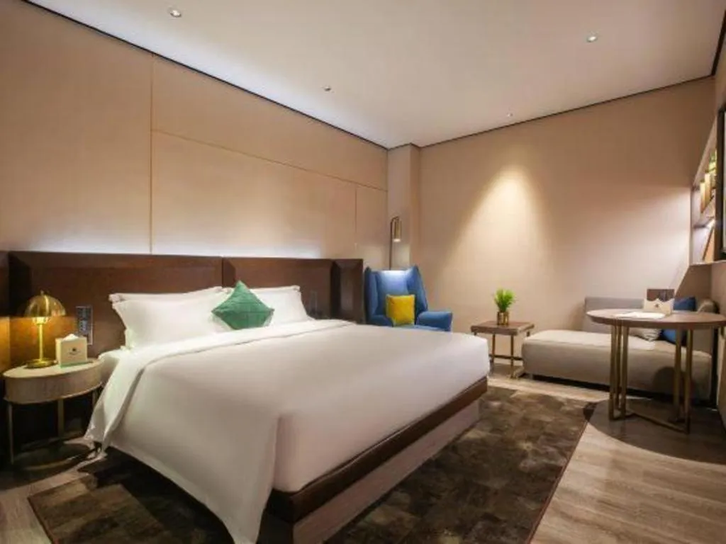 Bed in Echarm Plus Hotel Wuhan Wenhua Boulevard Dahualing Subway Statiom
