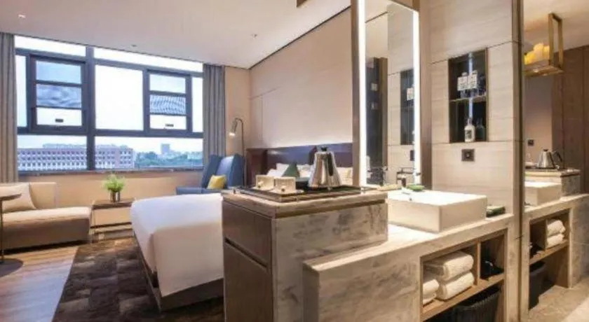 Bed in Echarm Plus Hotel Wuhan Wenhua Boulevard Dahualing Subway Statiom