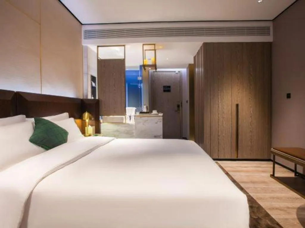 Bed in Echarm Plus Hotel Wuhan Wenhua Boulevard Dahualing Subway Statiom