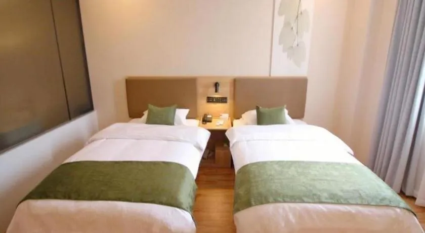 Bed in Green Tree Inn Jiangsu Changshu Southeast Yuyue Square
