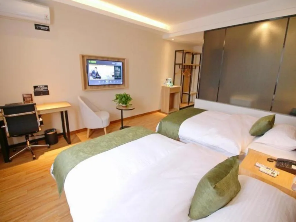 Bed in Green Tree Inn Jiangsu Changshu Southeast Yuyue Square