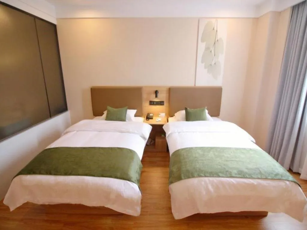 Bed in Green Tree Inn Jiangsu Changshu Southeast Yuyue Square