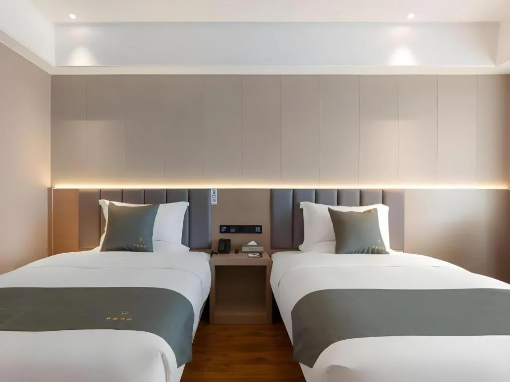Bed in Gya Hotel Kunming Zijin Center Xiaodongcun Metro Station