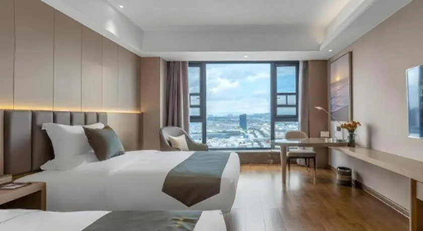 Bed in Gya Hotel Kunming Zijin Center Xiaodongcun Metro Station