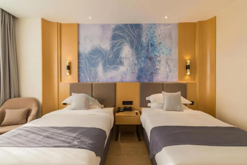 Bed in GreenTree Eastern Hotel Tianjin Dongli Development Zone Xinli Metro Station