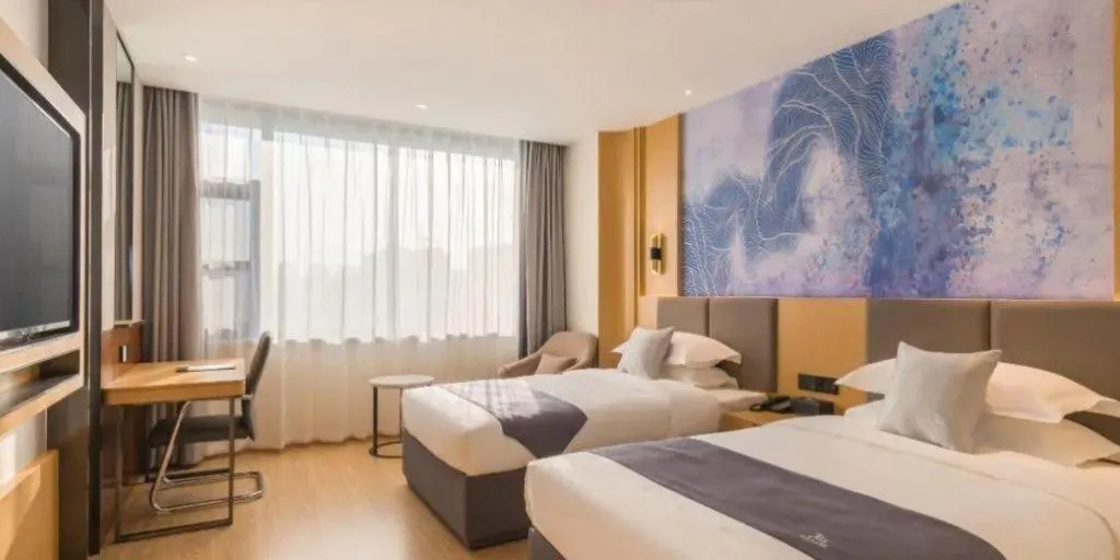 Bed in GreenTree Eastern Hotel Tianjin Dongli Development Zone Xinli Metro Station