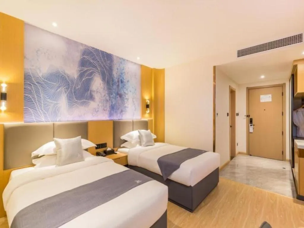 Bed in GreenTree Eastern Hotel Tianjin Dongli Development Zone Xinli Metro Station