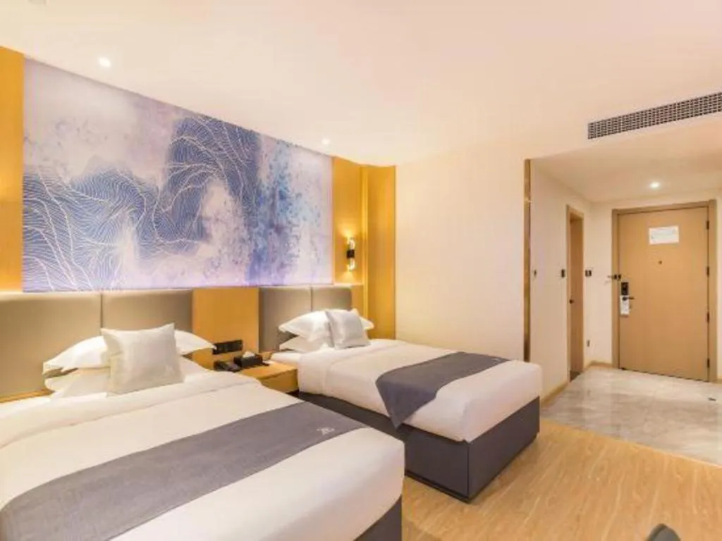 Bed in GreenTree Eastern Hotel Tianjin Dongli Development Zone Xinli Metro Station