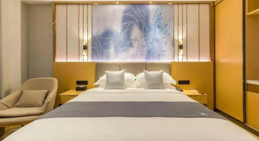 Bed in GreenTree Eastern Hotel Tianjin Dongli Development Zone Xinli Metro Station