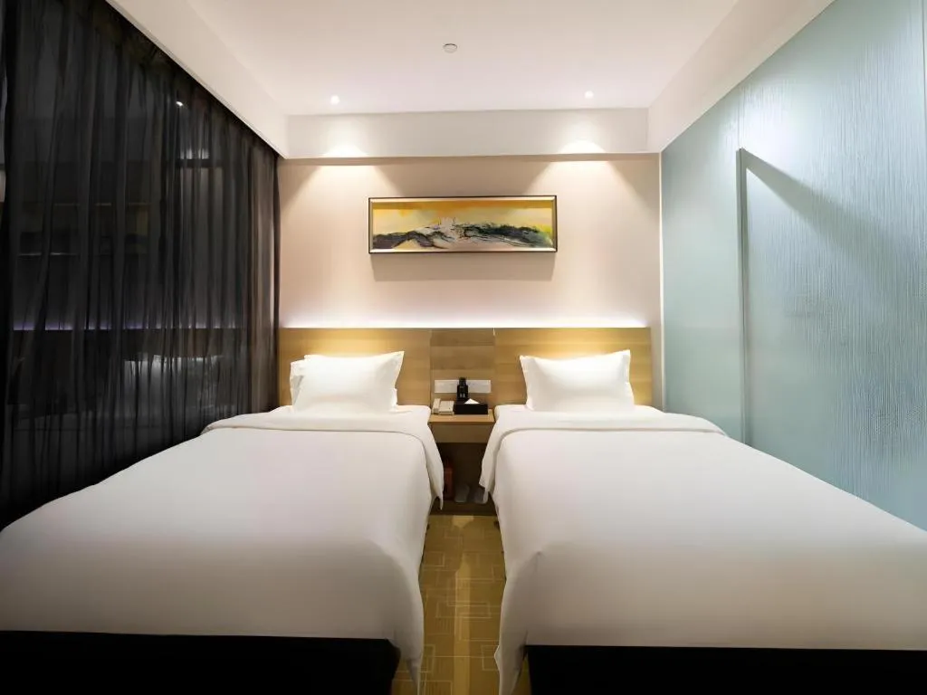 Bed in GreenTree Alliance Hotel Shenzhen Yantian District Dameisha