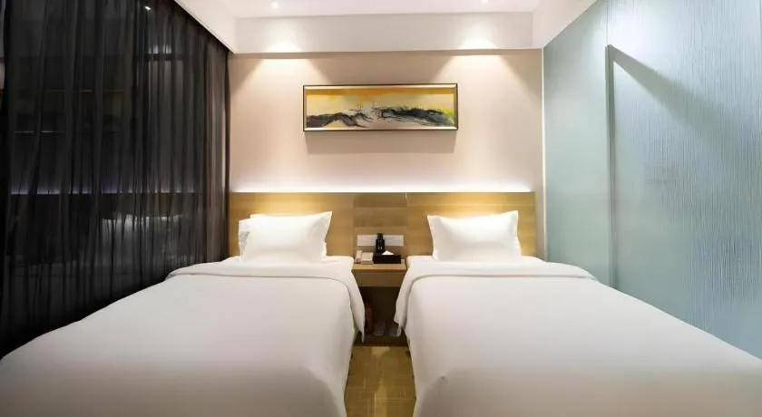Bed in GreenTree Alliance Hotel Shenzhen Yantian District Dameisha