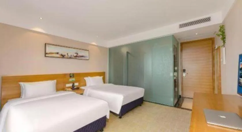 Bed in GreenTree Alliance Hotel Shenzhen Yantian District Dameisha