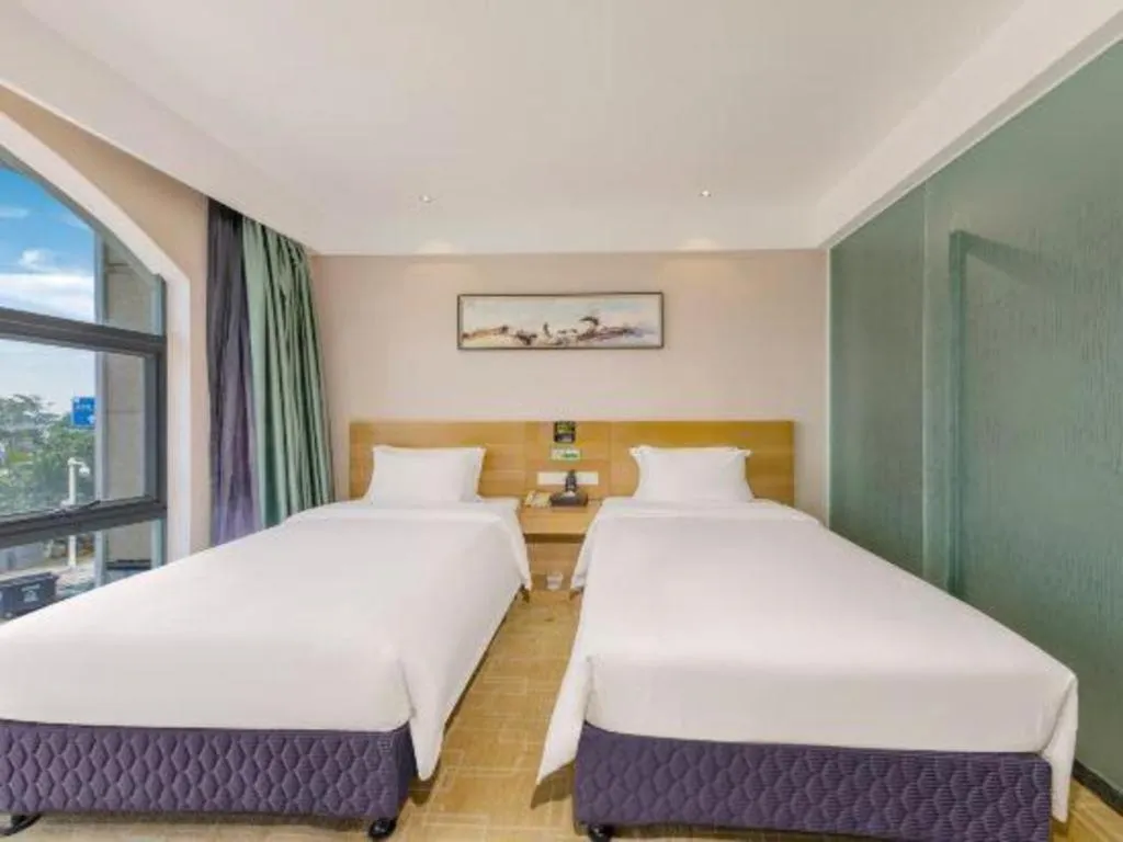 Bed in GreenTree Alliance Hotel Shenzhen Yantian District Dameisha