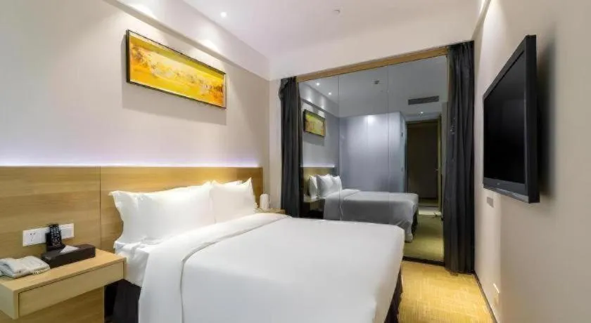 Bed in GreenTree Alliance Hotel Shenzhen Yantian District Dameisha
