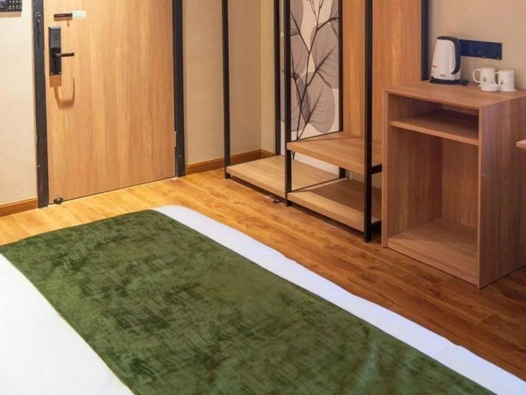 Bed in GreenTree Inn Express Suzhou Luzhi Ancient Town Scenic Area Xiaoshi Road