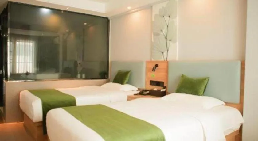 Bed in GreenTree Inn Express Hainan Haikou Haixiu Zhong Road