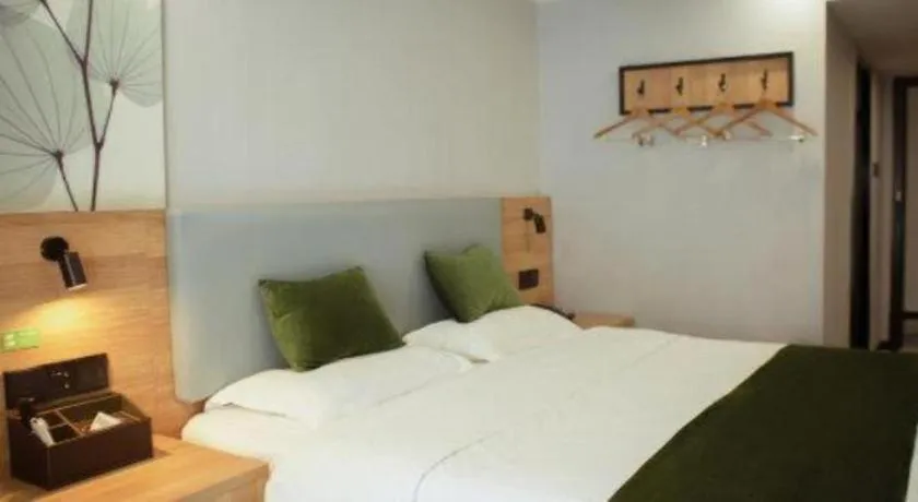 Bed in GreenTree Inn Express Hainan Haikou Haixiu Zhong Road