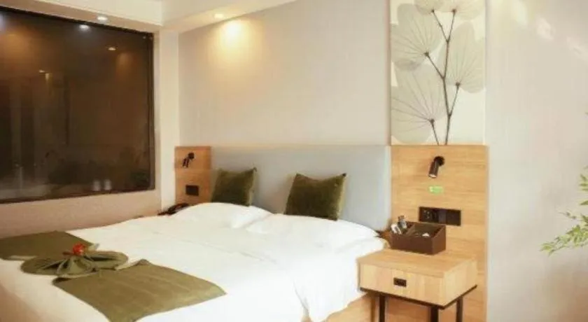 Bed in GreenTree Inn Express Hainan Haikou Haixiu Zhong Road