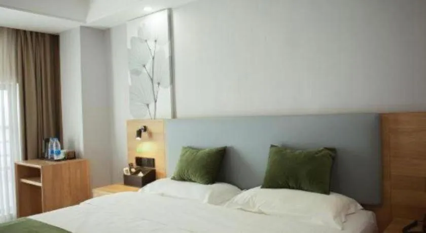 Bed in GreenTree Inn Express Hainan Haikou Haixiu Zhong Road