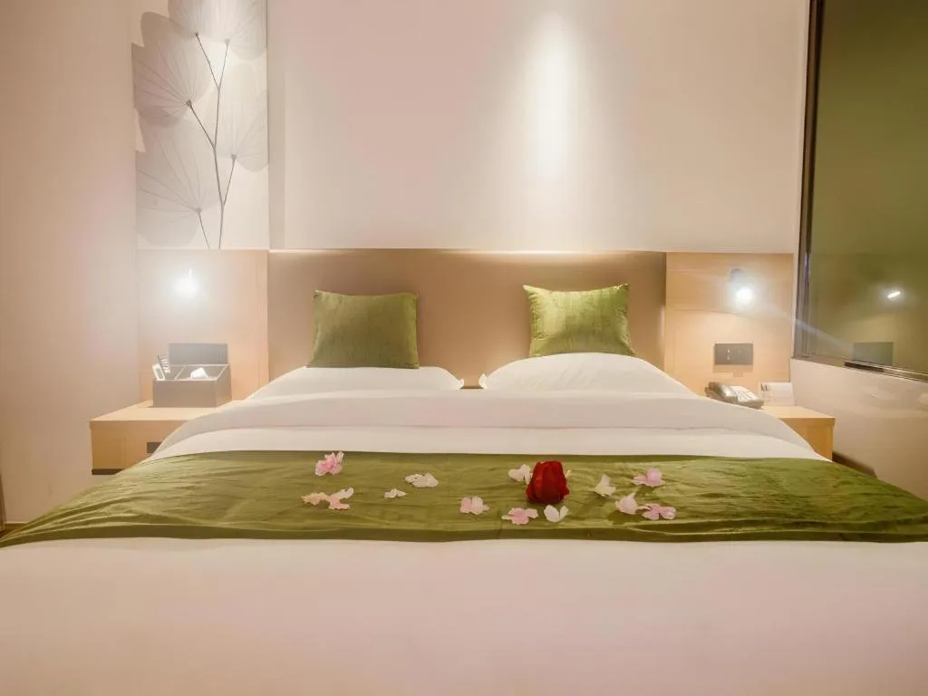 Bed in GreenTree Inn Express Hainan Haikou Haixiu Zhong Road