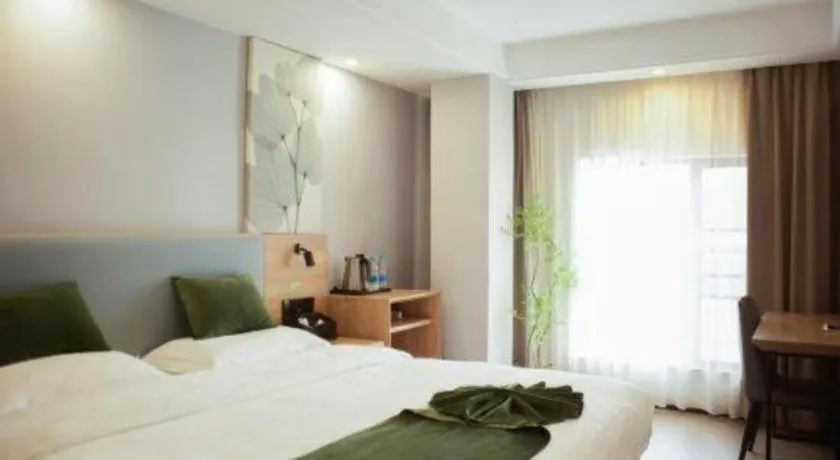 Bed in GreenTree Inn Express Hainan Haikou Haixiu Zhong Road