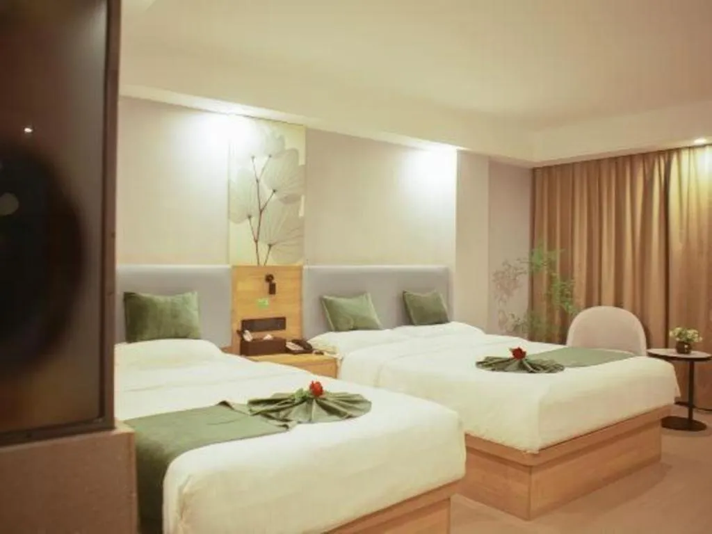 Bed in GreenTree Inn Express Hainan Haikou Haixiu Zhong Road