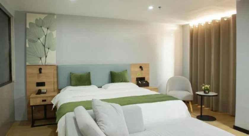 Bed in GreenTree Inn Express Hainan Haikou Haixiu Zhong Road