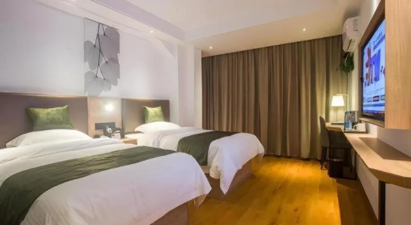 Bed in GreenTree Inn Express Hainan Haikou Haixiu Zhong Road