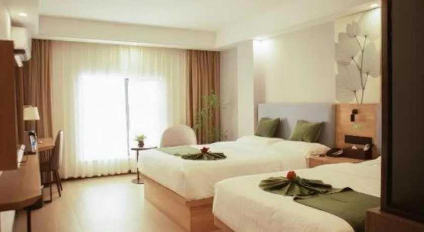Bed in GreenTree Inn Express Hainan Haikou Haixiu Zhong Road