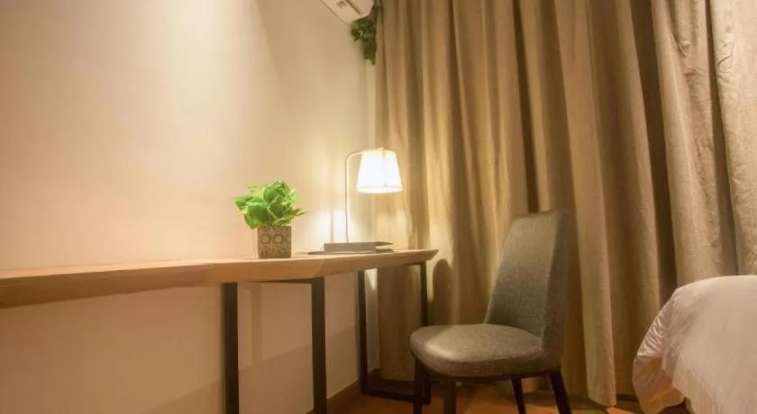 Bed in GreenTree Inn Express Hainan Haikou Haixiu Zhong Road