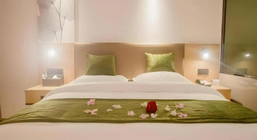 Bed in GreenTree Inn Express Hainan Haikou Haixiu Zhong Road