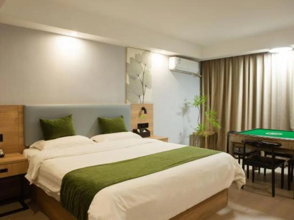 Bed in GreenTree Inn Express Hainan Haikou Haixiu Zhong Road